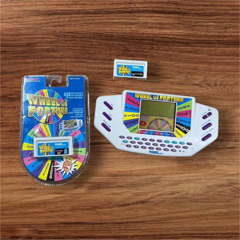 Vintage 1995 Tiger Wheel of Fortune Hand Held Game with 3 Cartridges Works